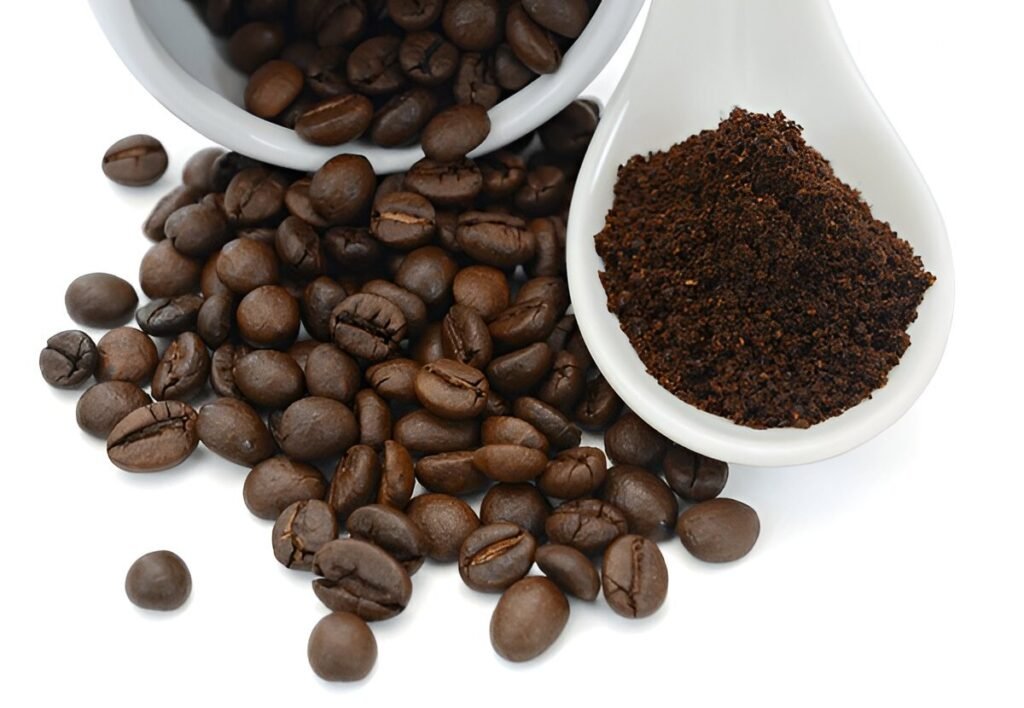 Premium coffee beans and tea blends arranged on a wooden table in a Dubai kitchen