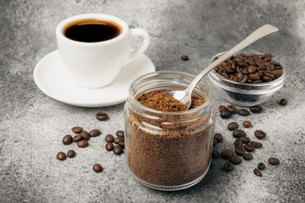 Instant coffee vs ground coffee comparison with cups, beans, and powder